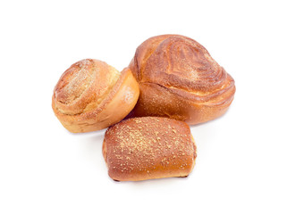 Three different sweet buns on a white background