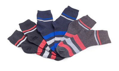 Different black men's socks with stripes on a white background