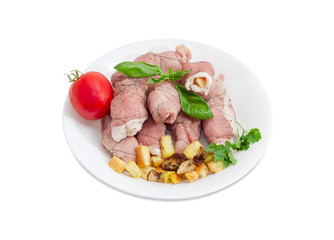 Uncooked meat roulades with filling from bread croutons and mushrooms