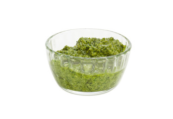 Pesto in the small glass bowl