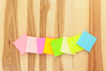 Blank sticky paper note on wall