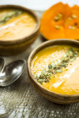 traditional autumn dish for Thanksgiving - pumpkin soup with garlic.