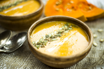 traditional autumn dish for Thanksgiving - pumpkin soup with garlic.