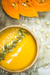 traditional autumn dish for Thanksgiving - pumpkin soup with garlic.