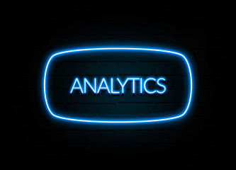 Analytics  - colorful Neon Sign on brickwall