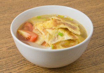 Delicious Thai Omelet Soup with Tomatoes and Scallion © arayabandit