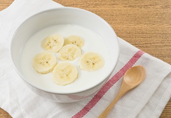 Bowl of Homemade Yoghurt with Ripe Banana