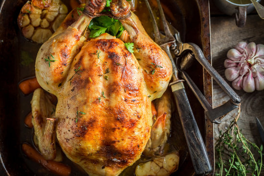 Tasty roasted chicken with thyme and garlic
