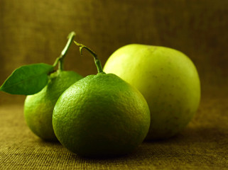 fruits,mandarins and an apple