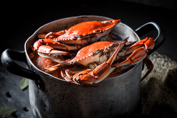 Ingredients for homemade crab in a old metal pot
