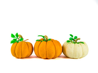 Three pumpkins isolated on white background