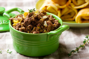 Liver stuffing in ceramic dish