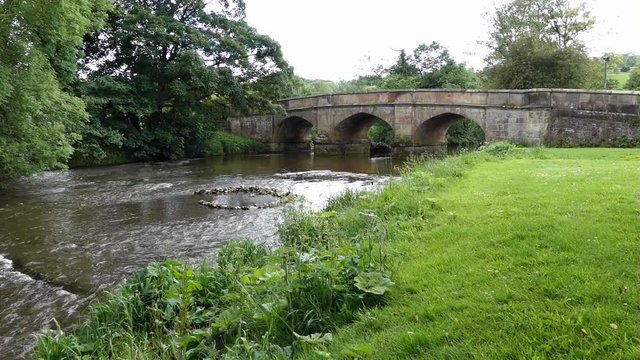 Ilam and Coldwall Bridge over the river Manifold, Ilam, Dove Dale,
The Peak District National Park, 
Staffordshire/Derbyshire, England