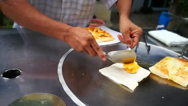 Cooking Thai eggs Pancake on the street on Bangkok. Thailand