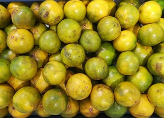 Citrus fruit, tangerine background. Fresh fruit at fruit market. Freshness and lively feeling concept.