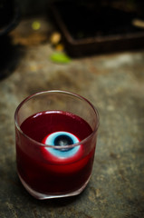 jelly with eyes on Halloween. red eye  in red jelly in a glass. halloween concpet