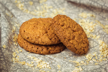 Oatmeal cookies on fabric.