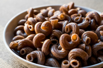 Cooked Whole Wheat Brown Pasta made with grape seeds