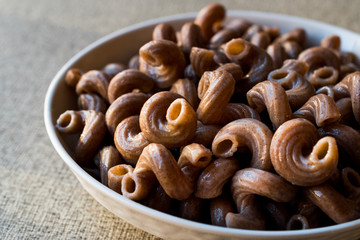 Cooked Whole Wheat Brown Pasta made with grape seeds