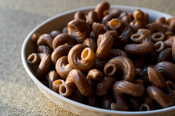Cooked Whole Wheat Brown Pasta made with grape seeds