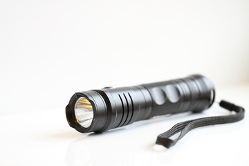 Manual black flashlight, reliability, quality, shine