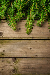 Christmas decoration over an old wooden background