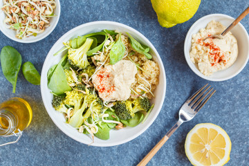 Buddha bowl with quinoa, broccoli and hummus.