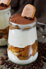 Italian dessert tiramisu on an old grunge background