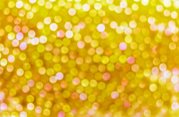 Gold beads with bokeh abstract light backgrounds.