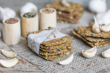 Healthy snack: cereal crunchy multigrain cereal flax seed pumpkin, coriander, sunflower seeds protein bread bar. Protein albumen source. Salted diet crispy crackers. Wholemeal.