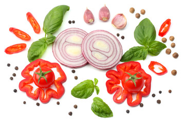 mix of slice of tomato, red onion, basil leaf, garlic, sweet bell pepper and spices isolated on white background. top view