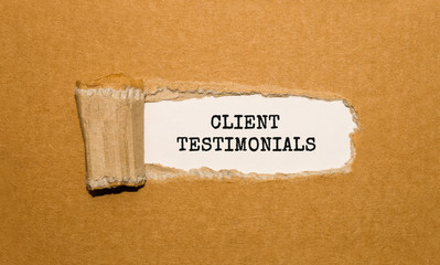 The text CLIENT TESTIMONIALS appearing behind torn brown paper