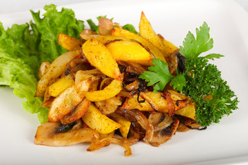 Fried potato with mushrooms