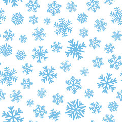 Seamless pattern with blue snowflakes
