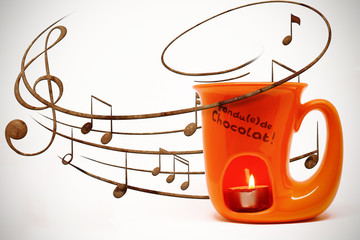 Illustration of  hot chocolate mug heated with a candle.  