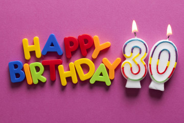 Number 30 happy birthday celebration candle