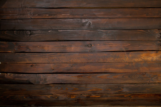 Fototapeta Dark boards wooden abstract background. Top view