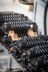 Naklejka premium Pile of motorcycle shock absorbers