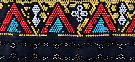 detail of old bracelet made of plastic beads