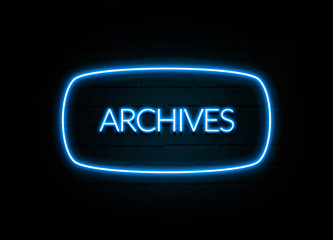 Archives  - colorful Neon Sign on brickwall
