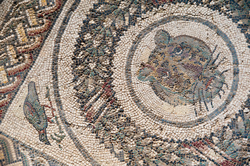 Old roman mosaics in the famous imperial Villa del Casale in Piazza Armerina, Sicily, Unesco world heritage of the 4th century A.C.