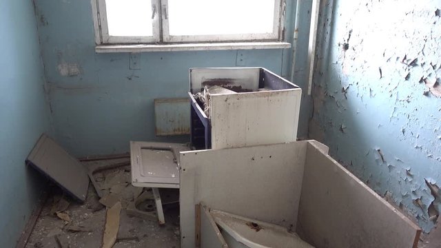 Chernobyl zone, Ukraine - 18th of June 2017: Visit to Pripyat Ghost Town - 4K Kitchen after pillage in one of Pripyat residential houses