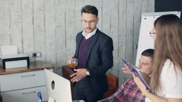 Group of young business people working together in creative office