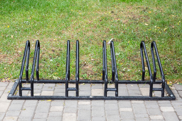 Fototapeta premium Bicycle parking of black color.