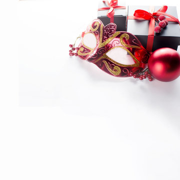 Black christmas  gift  box with red ribbon and nask
