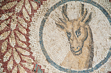 Old roman mosaics in the famous imperial Villa del Casale in Piazza Armerina, Sicily, Unesco world heritage of the 4th century A.C.