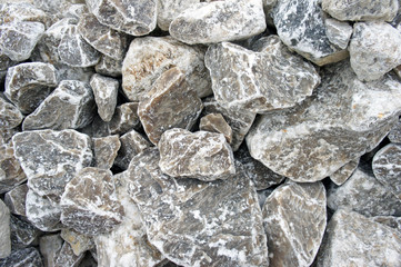 Gray sharp stone texture background, close up