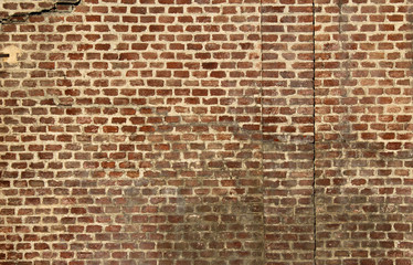 Old wall made of terracotta bricks