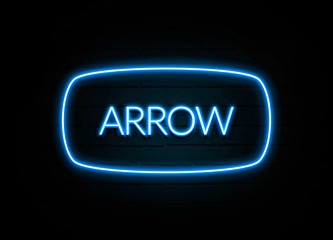 Arrow  - colorful Neon Sign on brickwall