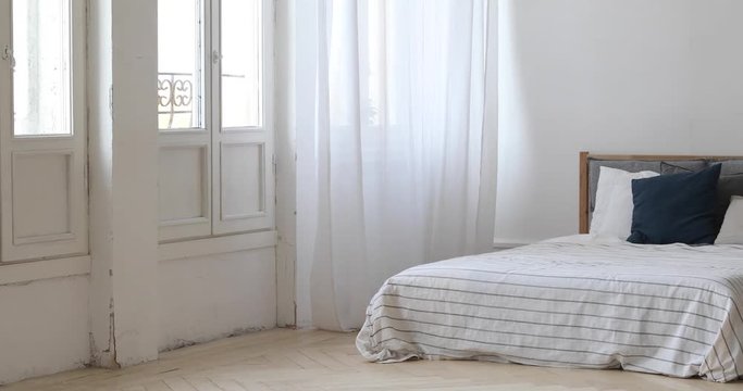 Panorama of Interior of white cozy bedroom